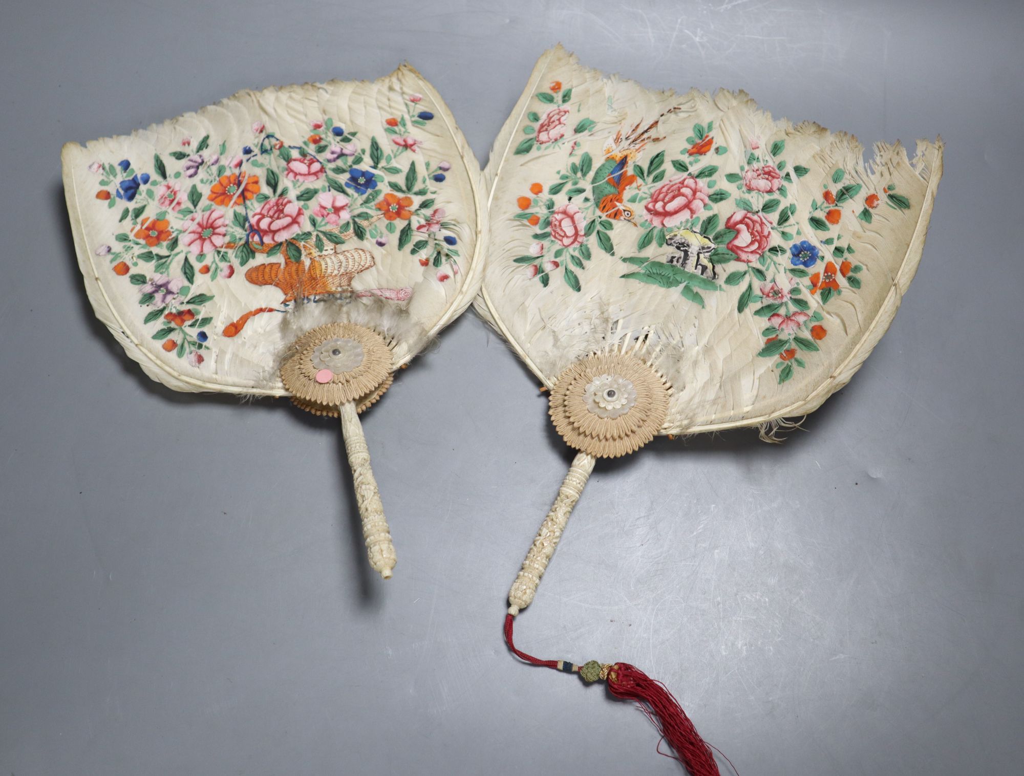 Two Chinese ivory handled painted feather fans, 19th century, length 28cm